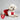 Bichon Frise wearing Arsenal Pet kit size M